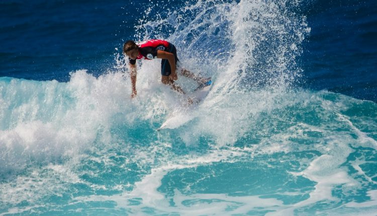 man surfing wave caribbean